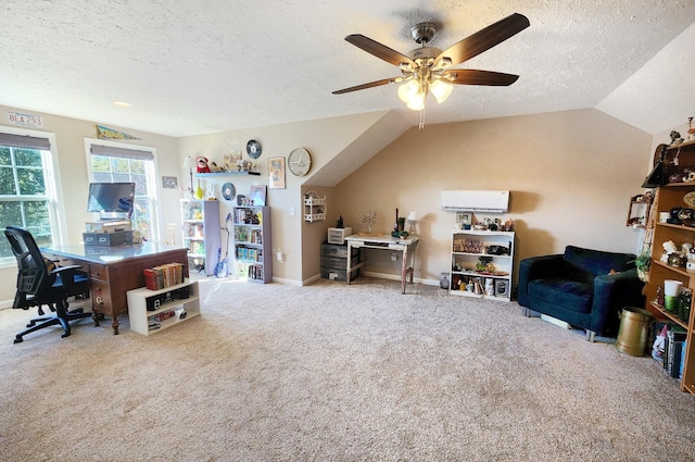 carpeted office space with ceiling fan, a textured ceiling, and vaulted ceiling