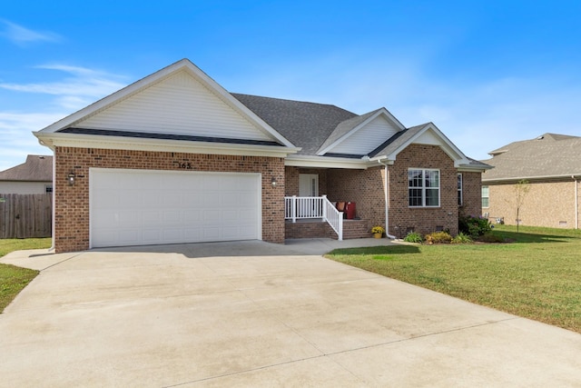 view of front of house with a front lawn and a garage