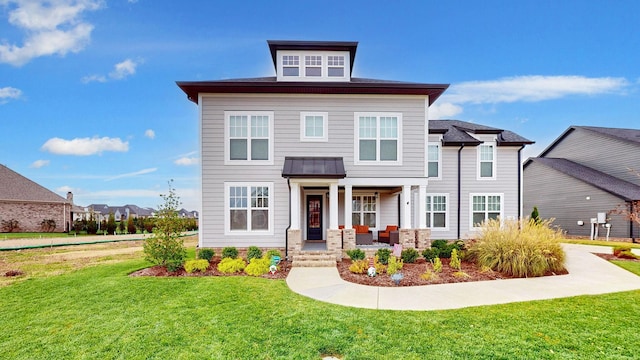 view of front of property featuring a front yard