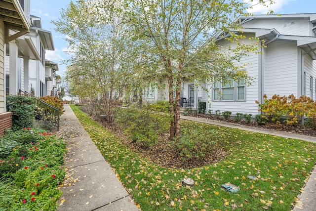 exterior space featuring a front lawn