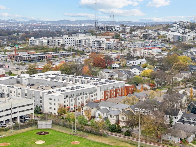 birds eye view of property with a mountain view