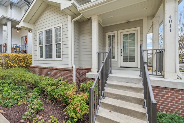 entrance to property with covered porch