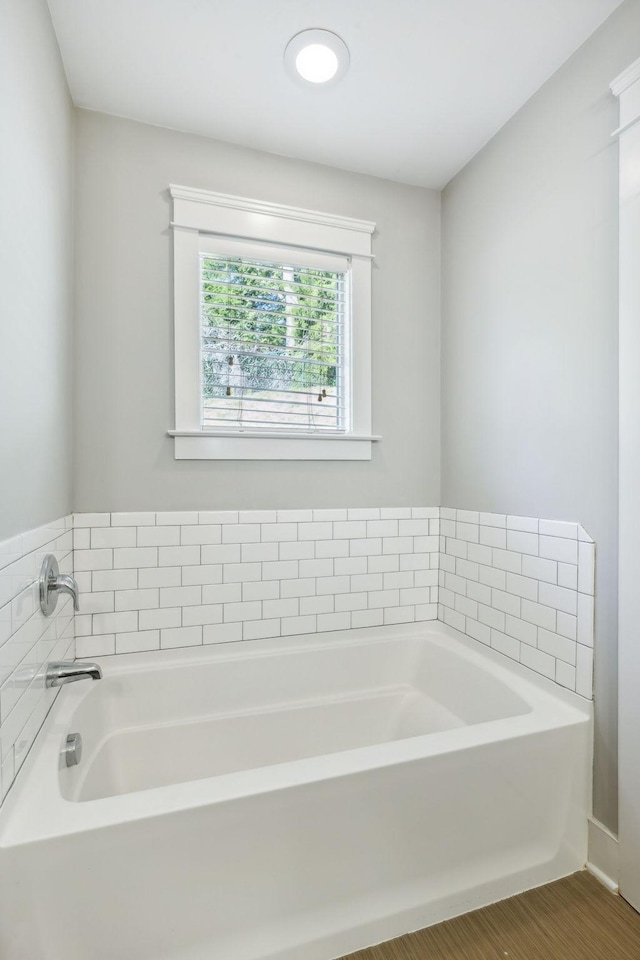 bathroom with a bathing tub