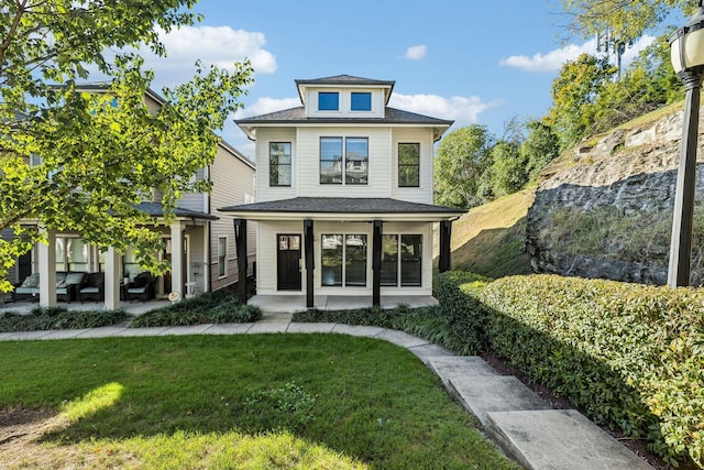 view of front of home featuring a front lawn