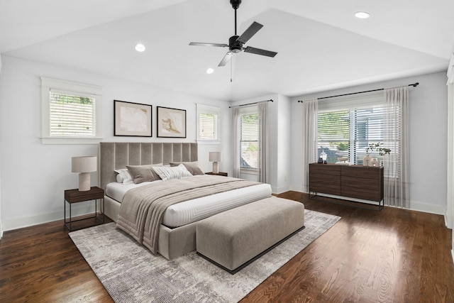 bedroom with lofted ceiling, dark hardwood / wood-style flooring, and ceiling fan