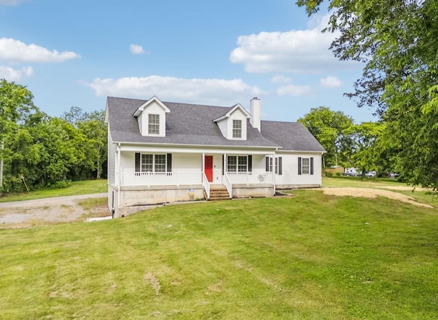 cape cod-style house featuring covered porch and a front yard