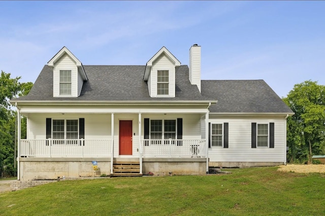 cape cod home featuring a front yard and a porch