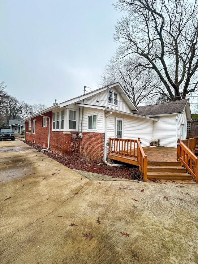 view of front of house featuring a deck