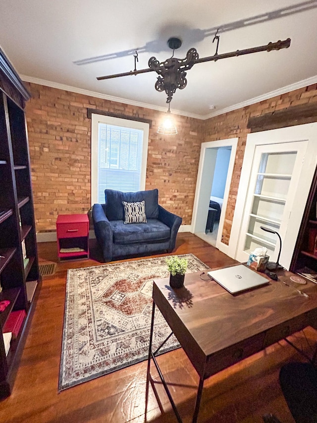 living room featuring built in shelves, dark wood-type flooring, ceiling fan, and crown molding