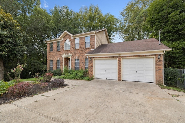 colonial home with a garage