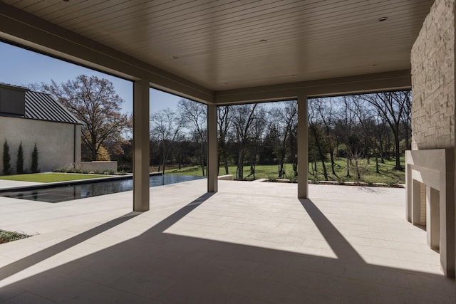 view of patio featuring a water view