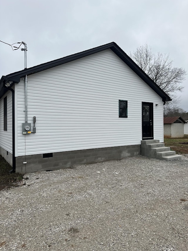 view of property exterior featuring crawl space