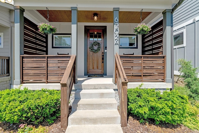 entrance to property with a porch