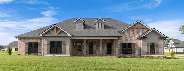 view of front of home with a front lawn