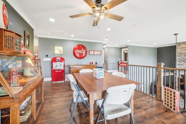 dining space featuring ceiling fan, crown molding, and dark wood-type flooring