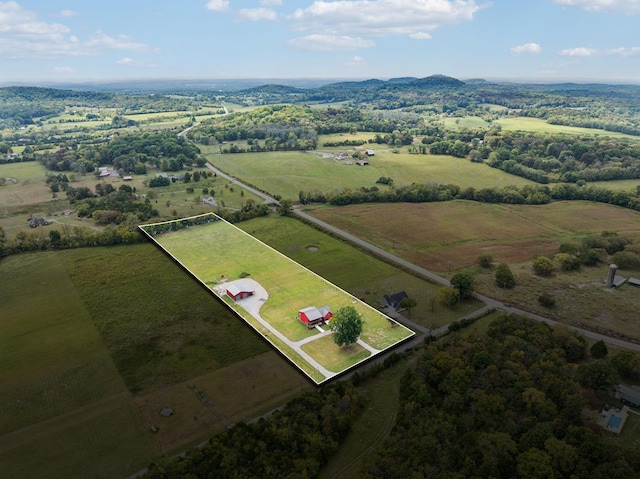 birds eye view of property featuring a rural view