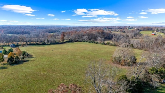 birds eye view of property featuring a rural view