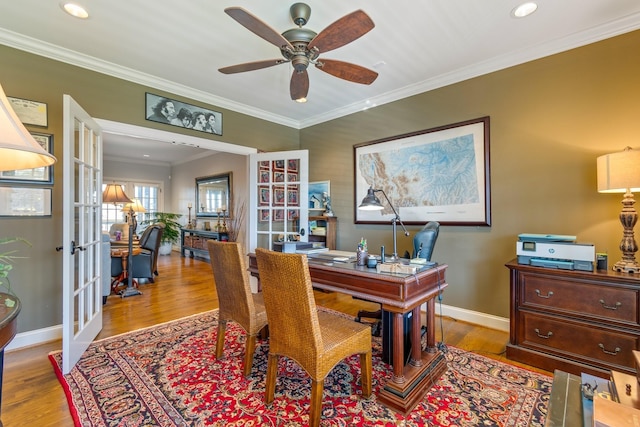 office area featuring french doors, light hardwood / wood-style floors, ceiling fan, and crown molding