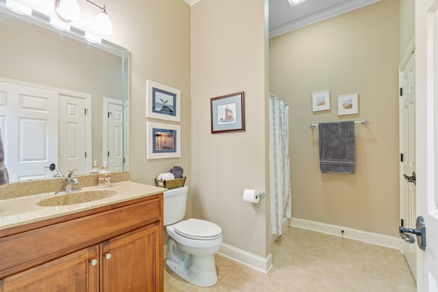 bathroom with crown molding, tile patterned flooring, vanity, and toilet