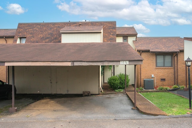 view of front of house with cooling unit