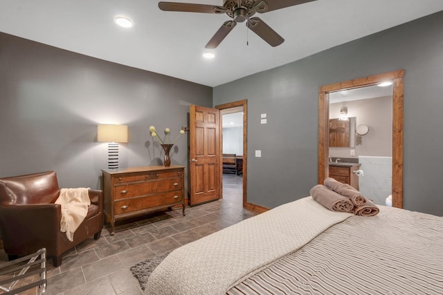 bedroom featuring connected bathroom and ceiling fan