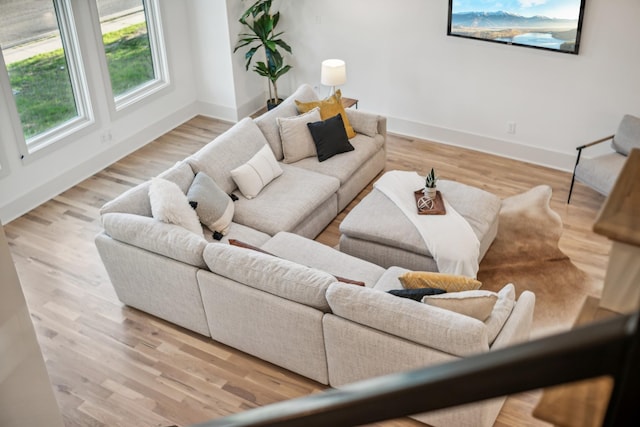 living room with light hardwood / wood-style flooring