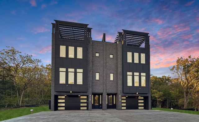 view of front of home with a garage