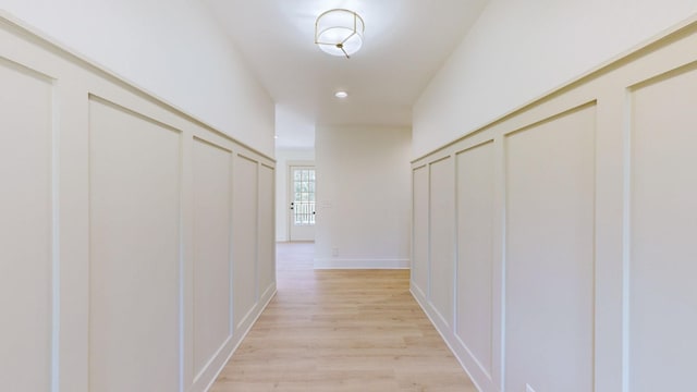 corridor featuring light hardwood / wood-style flooring