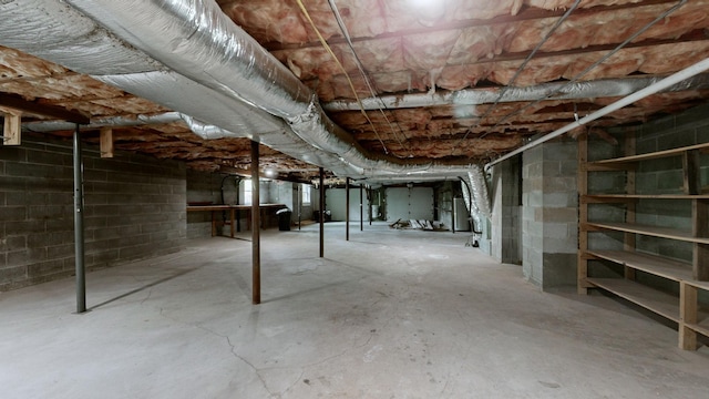 basement featuring water heater