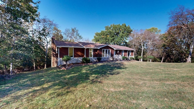 ranch-style house with a front yard