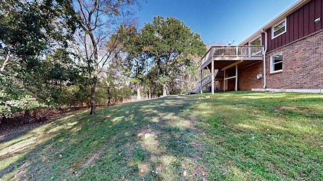 view of yard featuring a deck