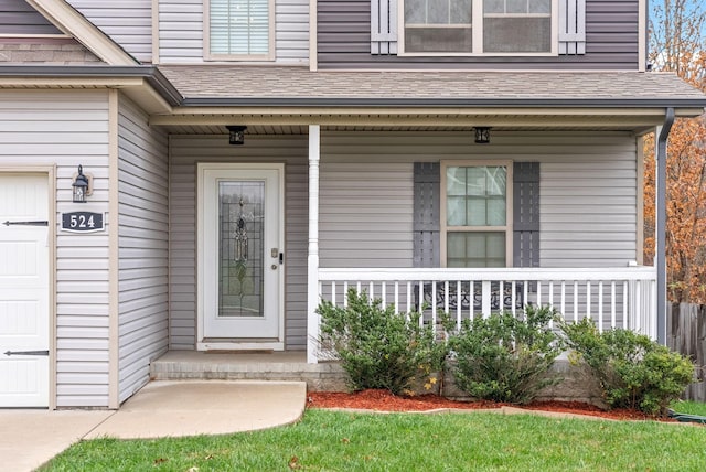 property entrance featuring covered porch