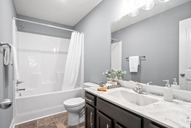 full bathroom with shower / tub combo, vanity, and toilet