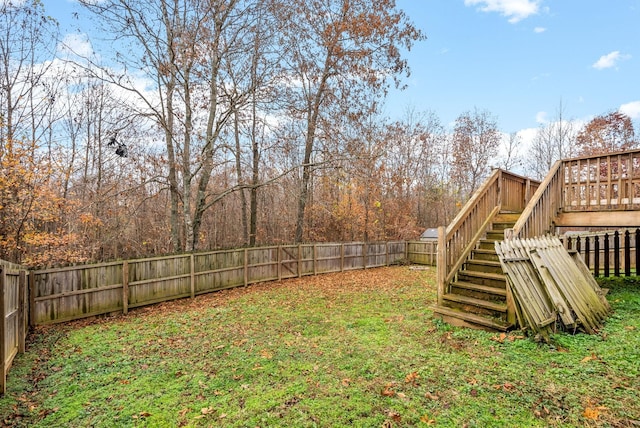 view of yard with a wooden deck