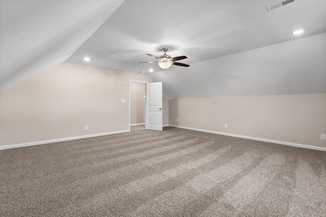 bonus room with ceiling fan, carpet, and lofted ceiling