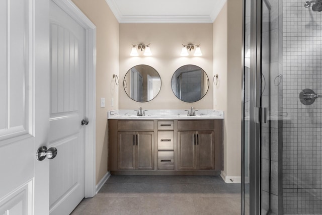 bathroom with vanity, an enclosed shower, and ornamental molding