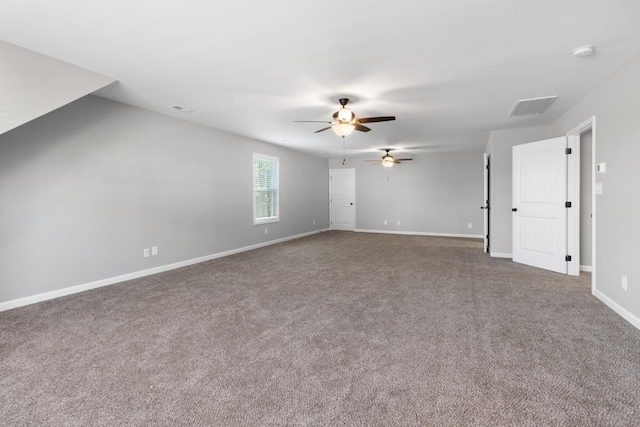 unfurnished room featuring carpet flooring and ceiling fan