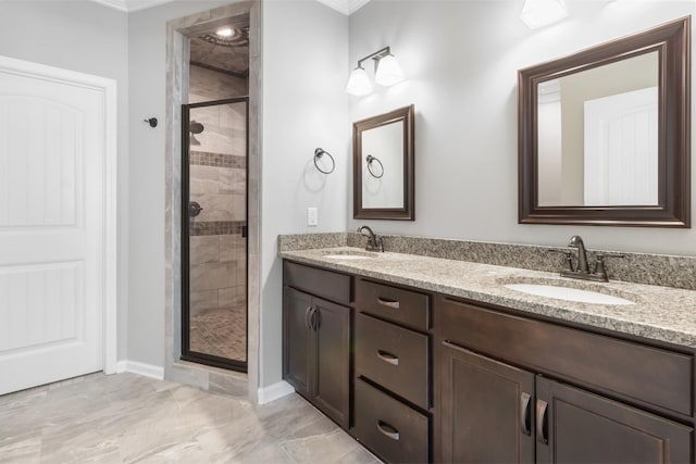 bathroom featuring vanity, an enclosed shower, and ornamental molding