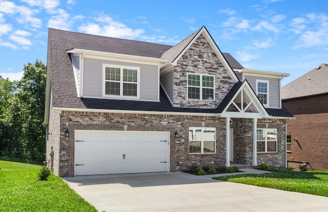 craftsman-style house with a front yard and a garage