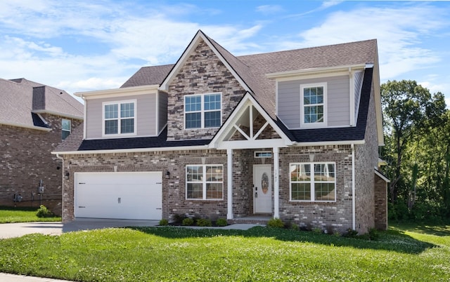 craftsman inspired home featuring a garage and a front lawn