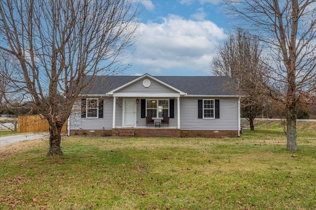 single story home with covered porch and a front yard