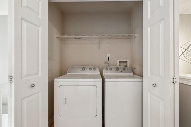 laundry area with washer and dryer