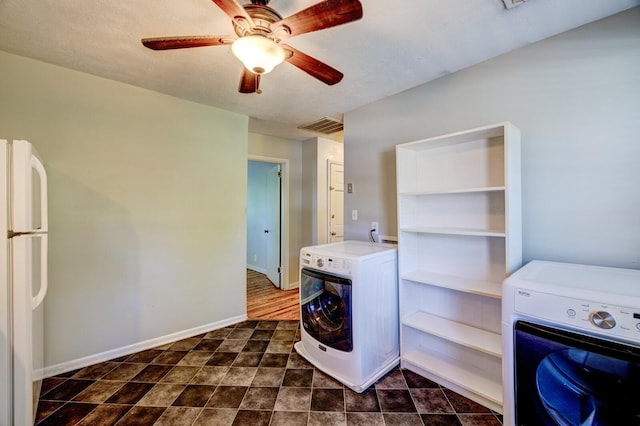 laundry room with ceiling fan and washer / dryer