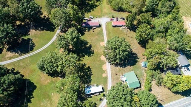 birds eye view of property with a rural view