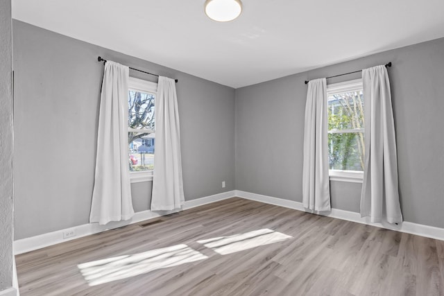 empty room featuring light hardwood / wood-style flooring