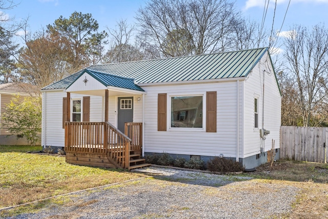 view of front of property with a front lawn