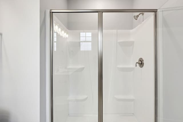 bathroom featuring an enclosed shower