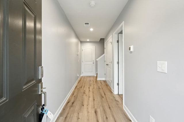 hallway featuring light hardwood / wood-style floors