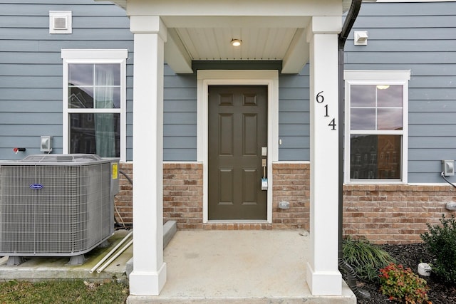 property entrance featuring central air condition unit