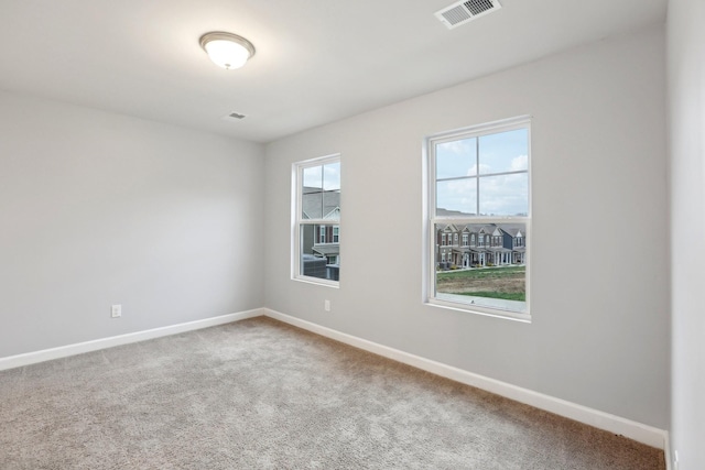 view of carpeted spare room